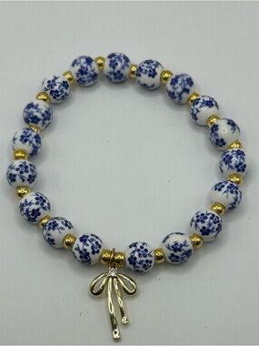 Blue and White Floral Bead Stretch Bracelet with Gold Charm